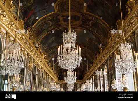 Chandeliers Of The Palace Of Versailles In The Hall Of Mirrors Stock