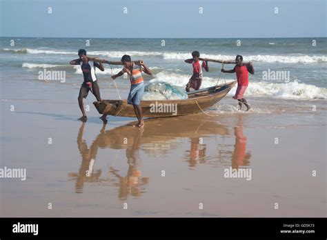 Fishermen Carrying Boat Beach Puri Orissa India Asia Stock Photo