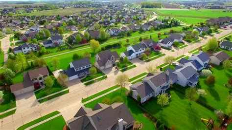 Beautiful Suburban Neighborhood With Stunning Homes Aerial View Stock Video Footage Dissolve