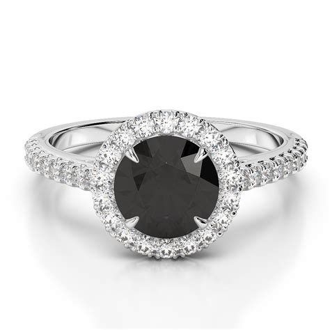 Check out our black diamond solitaire engagement ring selection for the very best in unique or custom, handmade pieces from our engagement rings shops. Gold / platinum round cut black diamond with diamond ...
