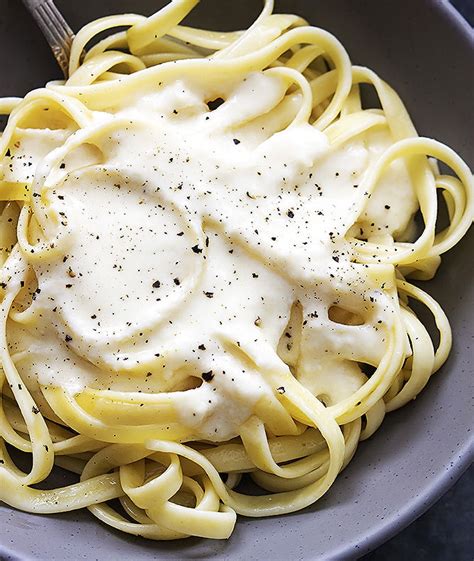 The splendid table has a basic version of fettuccine alfredo that calls for 2 cups of parmesan cheese and 5 tablespoons of butter, along with 1 pound of fettuccine and salt. Low Fat Alfredo Sauce Uses Greek Yogurt For High Protein And Less Fat