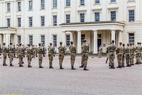 Soldiers Standing To Attention Being Inspected Outside Well Stock