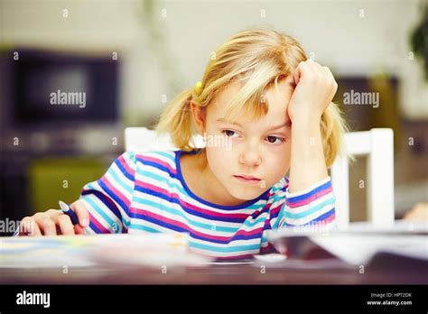 Little Girl Is Doing His Homework For Elementary School Stock Photo Alamy