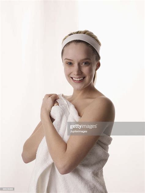 Woman Smiling Wrapped In Towel Photo Getty Images