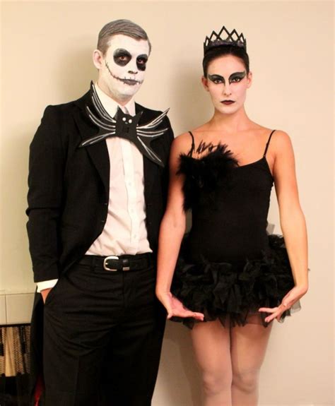 A Man And Woman Dressed Up In Costumes