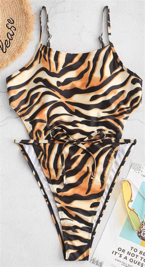A Defining Waist Detail Furthers The Flattery Of This Wild Tiger Print Swimwear Thats Styled