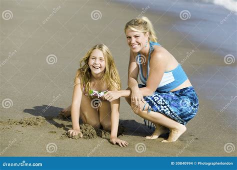 Mother And Babe Together On Beach Stock Photo Image Of Coast Clothing