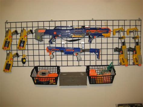 Space out 2 pegs at approximately the same length as hang a wire rack on your wall using screws, anchors, or other attachments depending on the wall material. Nerf Gun Display Rack Diy / Pin on Boys bedroom : Diy ...