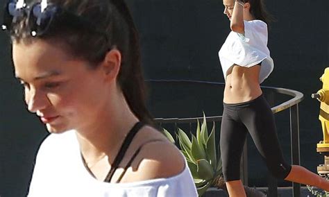 Miranda Kerr Shows Off Her Incredibly Toned Stomach In A Crop Top