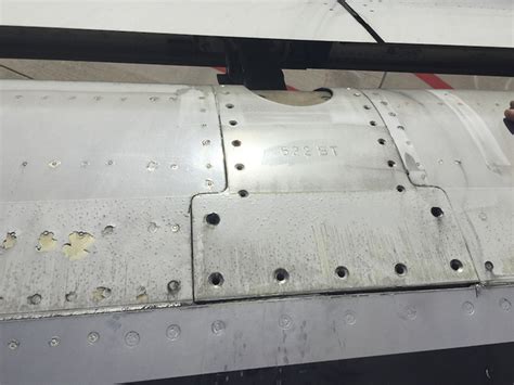 Passenger Discovers Missing Screws On Wing Of Frontier Airplane