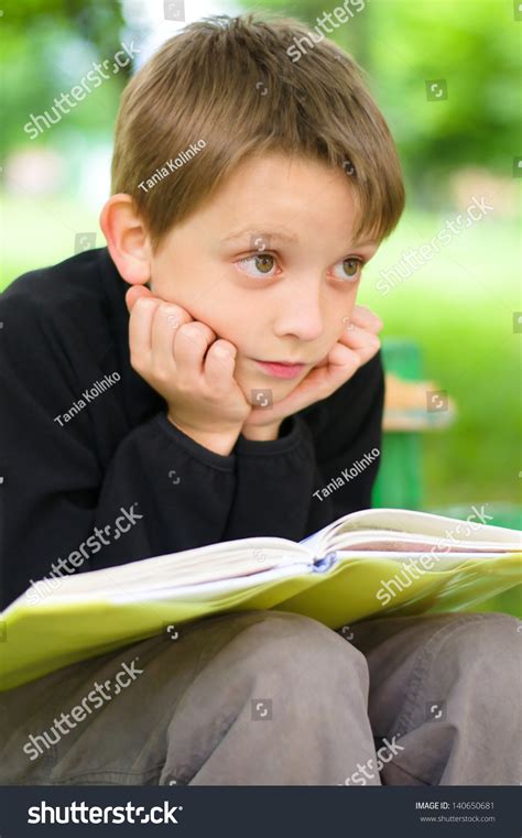 Young Boy Reading Book Park Stock Photo 140650681 Shutterstock