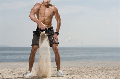 Man With A Naked Body Doing Kettlebell Exercise Stock Photo Image Of