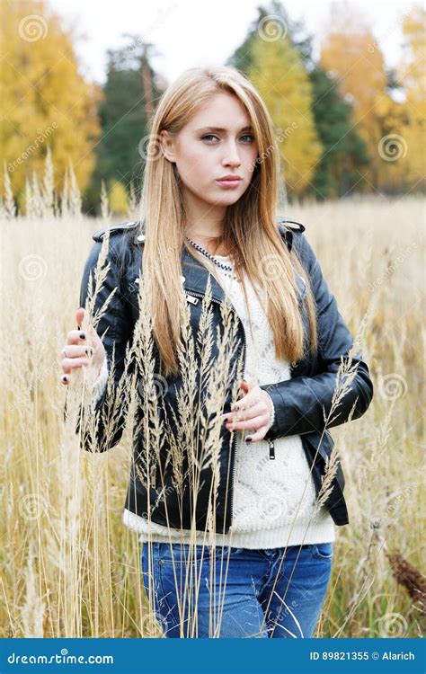 The Girl In A Leather Jacket Among A Grass Stock Image Image Of Enjoy