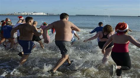 Bathers Brave The Cold Sea For Boxing Day Dip At Dover Seafront