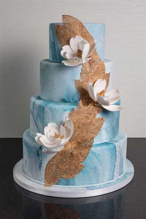 Blue And Gold Marbled Wedding Cake With Gold Lace And