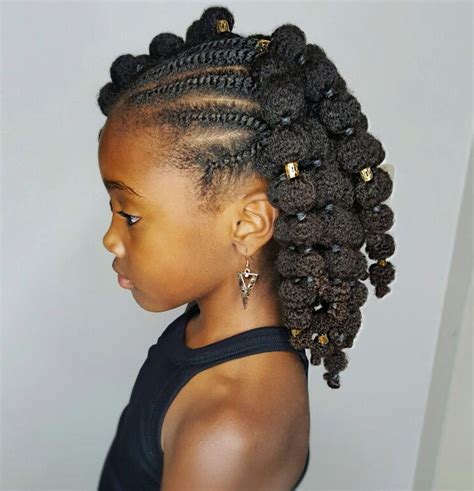 To bring the idea to life, you would apply light styling mousse to your damp locks and blow dry them with a lift at the roots to boost their. Mini puffs- Natural hairstyles for kids | Natural ...