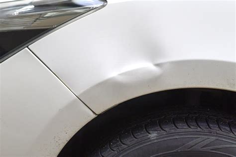 How To Pull A Dent Out Of A Car Fender Quick And Easy Fixes In The
