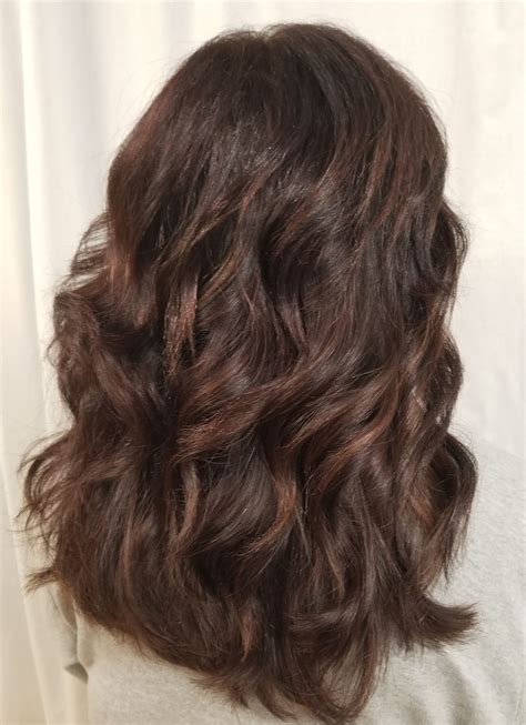 Medium Length Curls Dark Brown With Red Highlights Hair Color