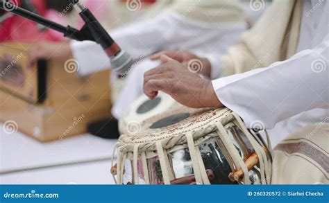 Man Playing Traditional Indian Classical Musical Instrument Tabla