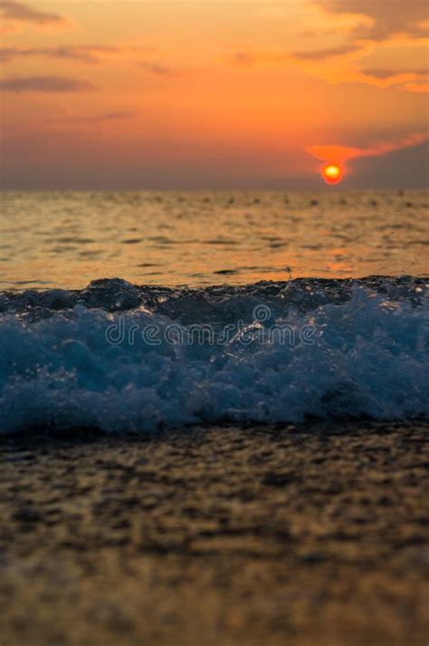 Amazing Sea Sunset On The Pebble Beach The Sun Waves Clouds Stock