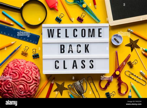 Welcome Back Class Lightbox Message On A Bright Yellow Background Stock