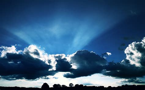 Sunshine Behind The Clouds Hd Wallpaper Background Image 1920x1200