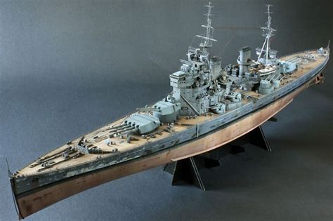 A Wooden Model Of A Battleship On Display