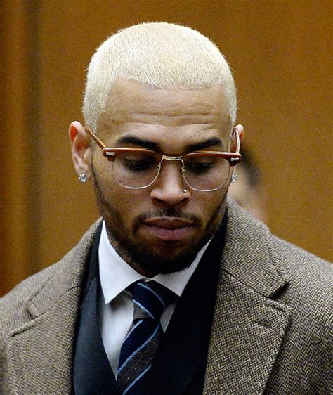 Singer chris brown and ammika harris welcomed their first child together in november and just recently shared the first photos showing the child's face, which the singer says resembles his. Chris Brown Shows Off New Blond Hair at Court Appearance