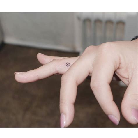 Minimalist Heart Tattoo On The Finger