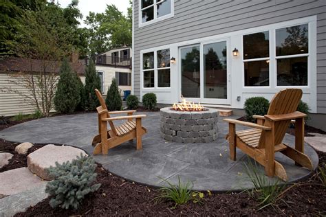 To achieve a tasteful front lawn patio, make an enclosed gravel area and add lawn chairs and stepping stones. 25+ Concrete Patio Outdoor Designs, Decorating Ideas ...