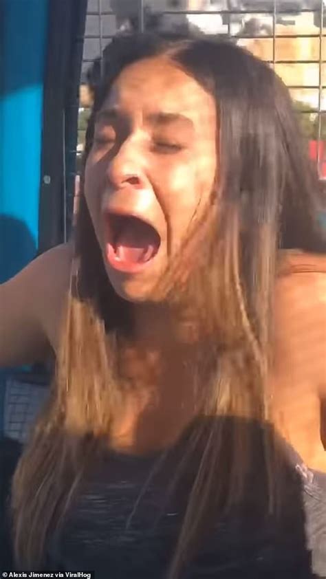hilarious moment terrified woman is tricked into getting on a swinging ferris wheel daily mail