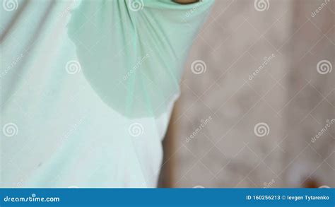 Young Woman With Sweat Stain On Her Clothes Against Grey Background
