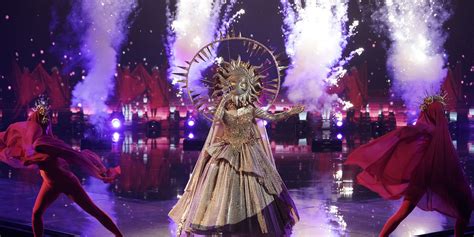 The Masked Singer Who Is The Countrypop Superstar Behind The Sun Costume