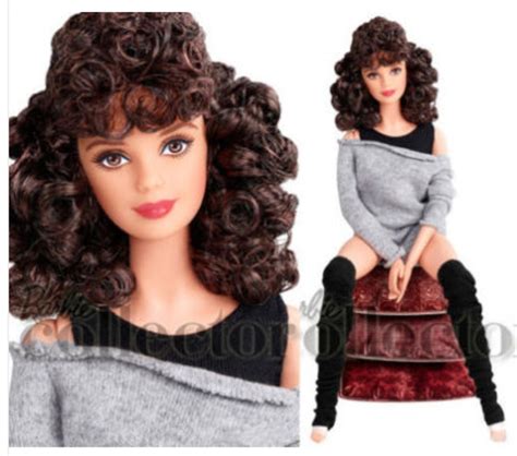 an image of a doll with curly hair