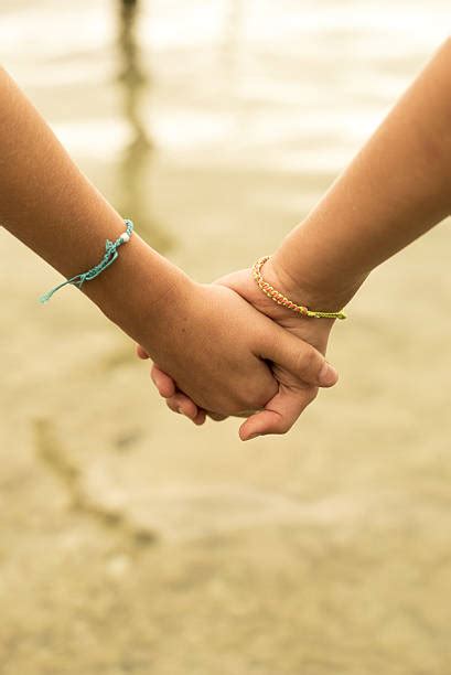 Two Girls Holding Hands Stock Photos Pictures And Royalty Free Images