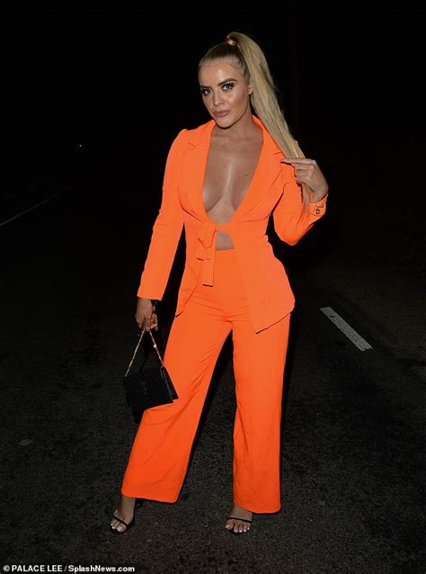 Eotbs Megan Clark Turns Heads As She Goes Braless In A Tangerine Suit