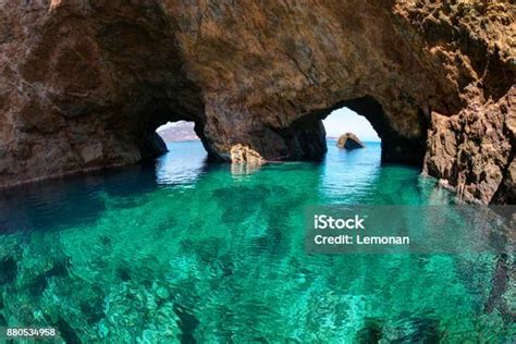 Twin Natural Rocky Arches With Clear Transparent Waters In Tragonissi