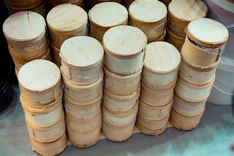 Closeup Of Wooden Round Containers Placed On Top Of Each Other In A