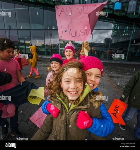 Icelandic Children Holding Signs Of Peace And Love During The Children
