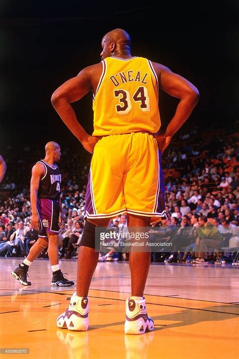 Shaquille Oneal Of The Los Angeles Lakers Stands On The Court During