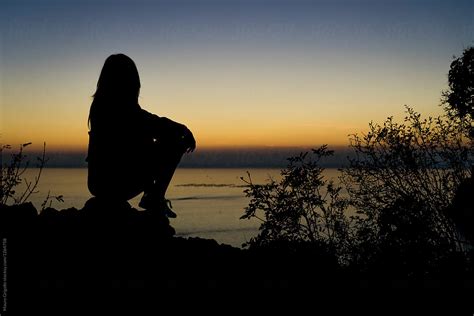 Pensive Woman Looking The Sea At The Dusk By Stocksy Contributor Mauro Grigollo Stocksy