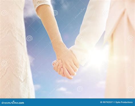 close up of married lesbian couple holding hands stock image image of homosexual couple 90792537