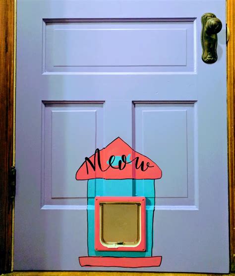 Install a cat door in a window! Painted Cat Door DIY - The Domestic Geek Blog