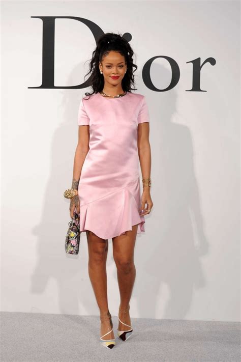 Rihanna Keeps It Sweet In A Pink Silk Dress At The Dior Cruise 2015