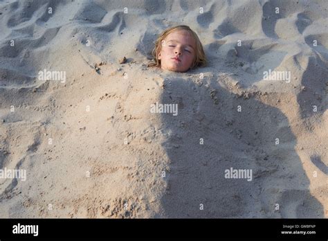 Lady Buried In Sand Telegraph