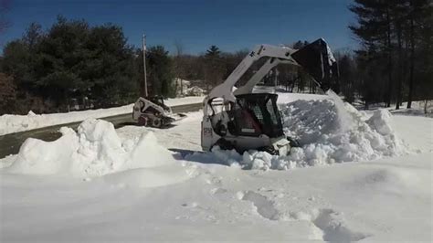 Bobcat S250 Pushing Up Snow Bank Youtube
