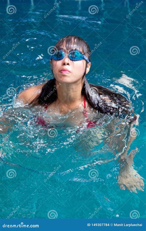 Beautiful Girl In A Sexy Bikini At The Pool Stock Photo Dens Us Hot