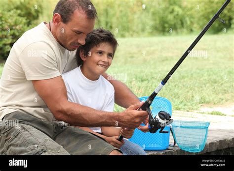 Father And Son Fishing Stock Photo Alamy