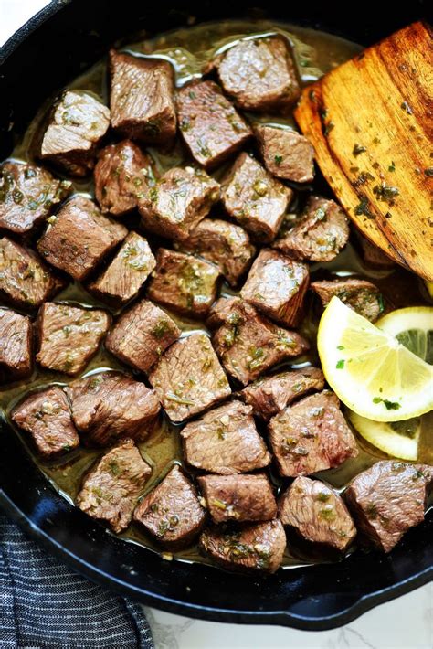 Add garlic and smoked sausage and cook until sausage is browned. Lemon Garlic Steak Bites - Life In The Lofthouse | Steak ...
