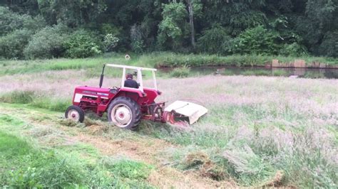 Mowing And Tedding First Hay 2019 Youtube